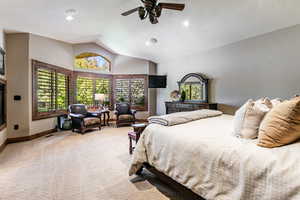 Bedroom featuring lofted ceiling, light colored carpet, recessed lighting, and ceiling fan