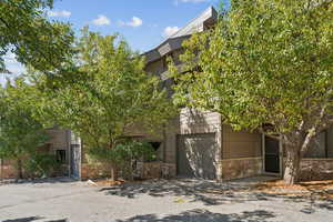 View of property with a garage