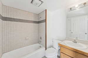 Bathroom with shower / tub combination and vanity