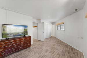 Living area featuring light wood finished floors