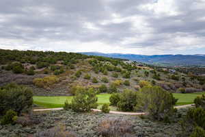 View of mountain background with a golf course