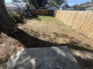 View of fenced backyard