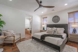 Bedroom with recessed lighting, ceiling fan, and ensuite bathroom