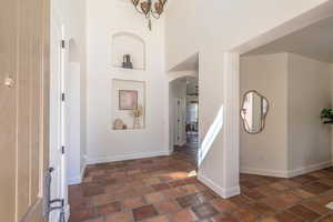 Hall with arched walkways and a towering ceiling