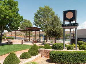 Surrounding community featuring a pergola and a patio area