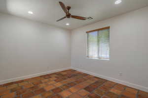Unfurnished room with recessed lighting and ceiling fan