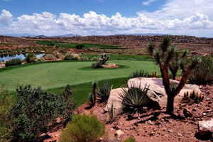 Surrounding community featuring golf course view and a water and mountain view