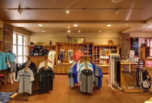 Misc room featuring beamed ceiling and carpet floors