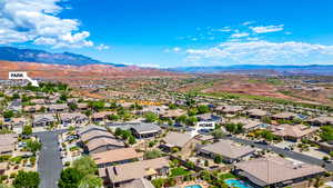Aerial view of residential area with a mountainous background