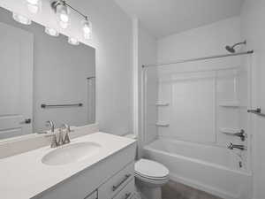 Full bathroom with shower / bath combination and vanity