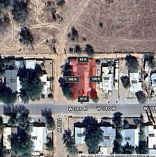 Aerial map of property and surrounding area with property boundaries highlighted