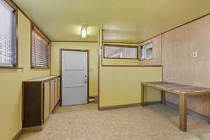 Below grade area with light floors and baseboards