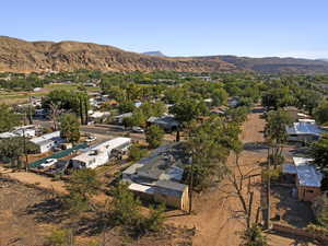 Aerial view of residential area featuring mountains