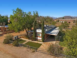 View from above of property featuring a mountainous background
