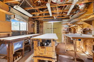 Basement featuring a workshop area