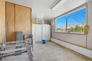 Garage featuring a mountain view