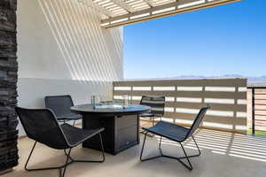 View of patio / terrace featuring a pergola, a mountain view, and outdoor dining area