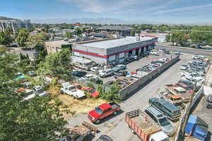 Drone / aerial view of mountains and a commercial area