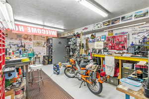 Garage featuring a workshop area
