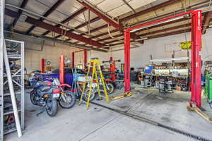 Garage featuring a workshop area