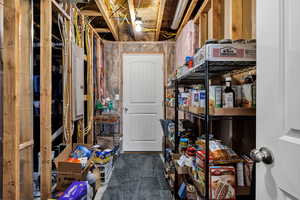 Storage with electric panel and access door to cold storage area