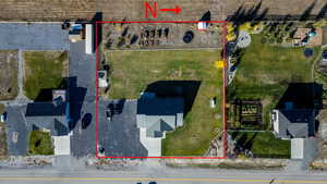 Aerial overview of property's location with property parcel outlined