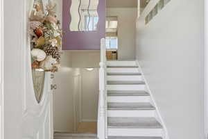 Stairs with tile patterned flooring