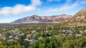 Mountain view featuring nearby suburban area