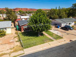 Aerial view of residential area with a mountainous background