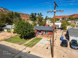 Aerial view of residential area featuring a mountain backdrop