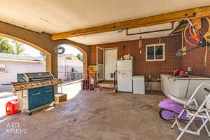 View of patio / terrace featuring a grill