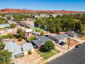 Aerial view of residential area featuring a mountain backdrop