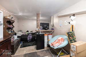 Living area featuring a textured ceiling