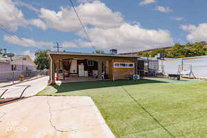 Rear view of house featuring a patio area