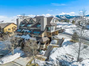 Snowy aerial view with a mountain view