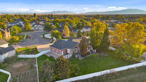 Aerial view of residential area featuring a mountain backdrop