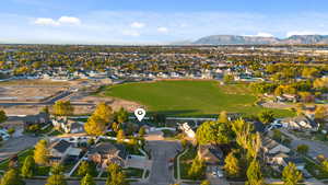 Aerial view of residential area with a mountainous background