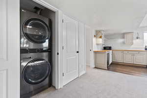 Laundry room with stacked washer / dryer