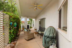 View of patio / terrace featuring a ceiling fan and an outdoor hangout area