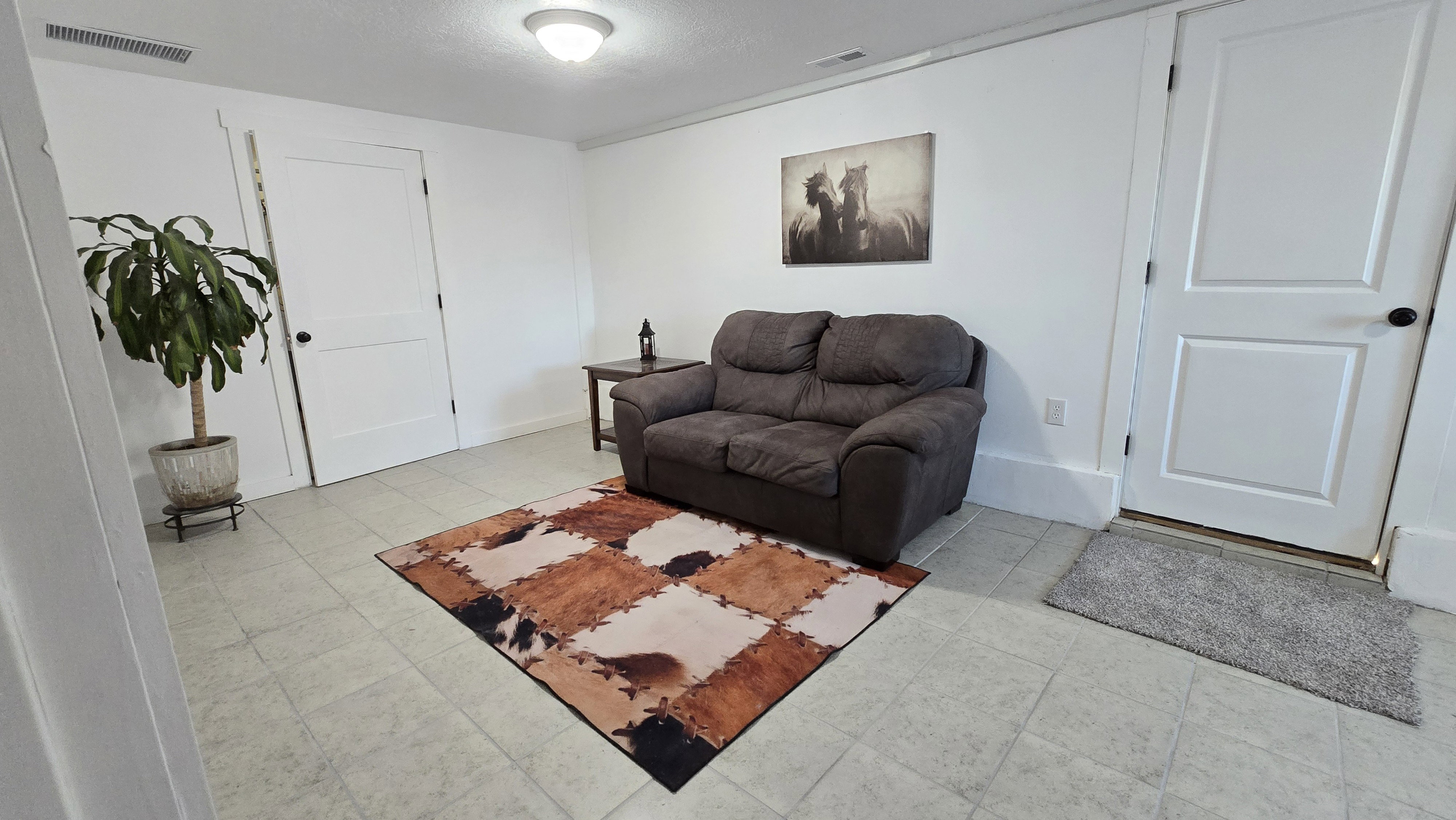 Light-toned tile flooring throughout