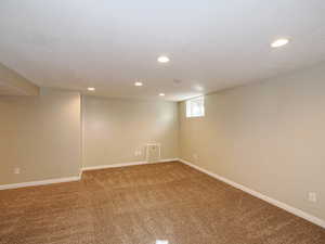 family room view of access panel to water valve