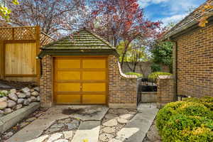 Gate featuring an outdoor structure