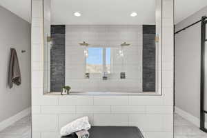 Full bathroom featuring a walk in shower, light marble finish flooring, and recessed lighting