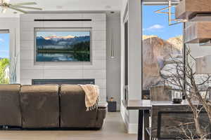 Living area featuring healthy amount of natural light and wood finished floors