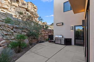 View of patio with a mountain view