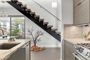 Stairs featuring tile patterned floors