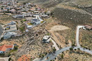 Aerial view of property's location featuring nearby suburban area