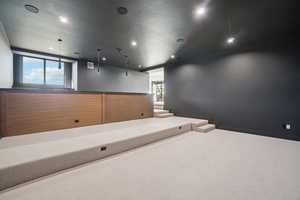 Spare room with recessed lighting and carpet flooring