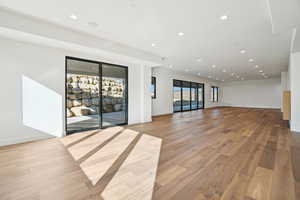 Spare room with recessed lighting and light wood-style flooring