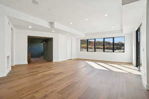 Unfurnished room featuring light wood finished floors and recessed lighting